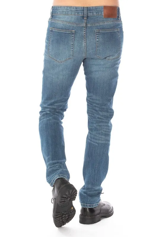 DISTRESSED SLIM TAPER DENIM JEANS