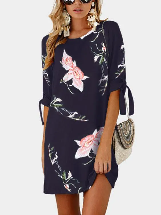 Wholesale Navy Floral Print Round Neck Half Sleeve Self-Tie Mini Dresses